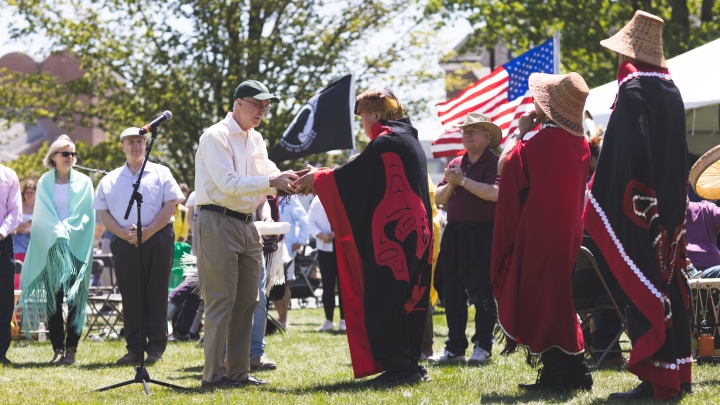 Dartmouth's president repatriating a headdress from the late 19th century to a delegation from the Gitxaała Nation