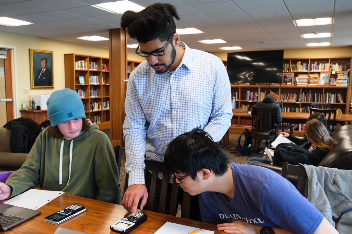 Jordan Ferreras working with students