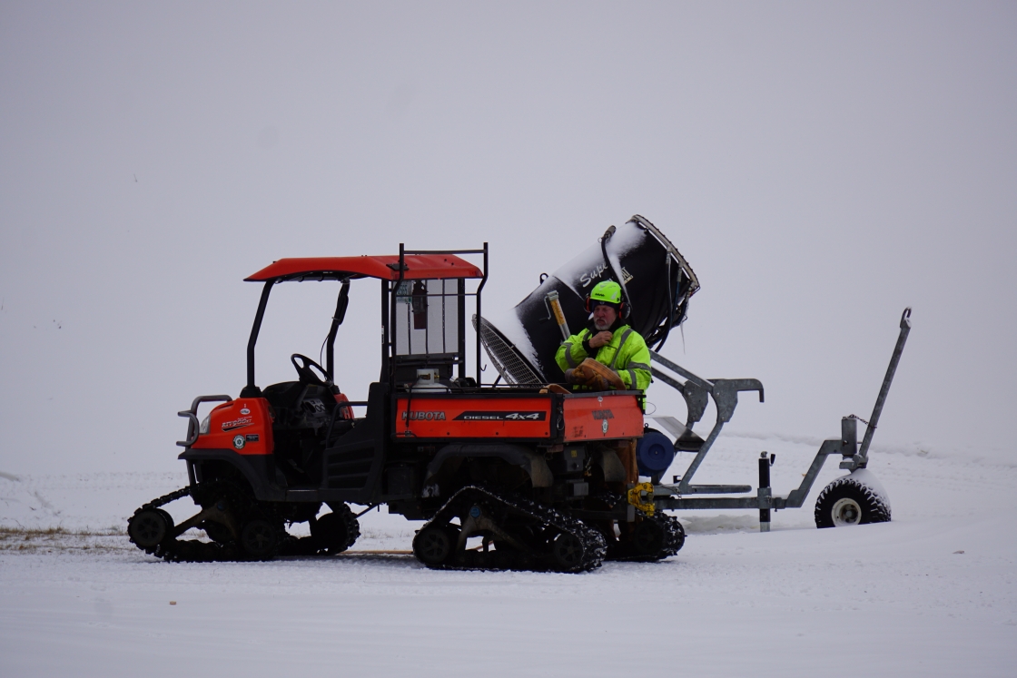 Red snowcat and snowmaker Ed Tessman