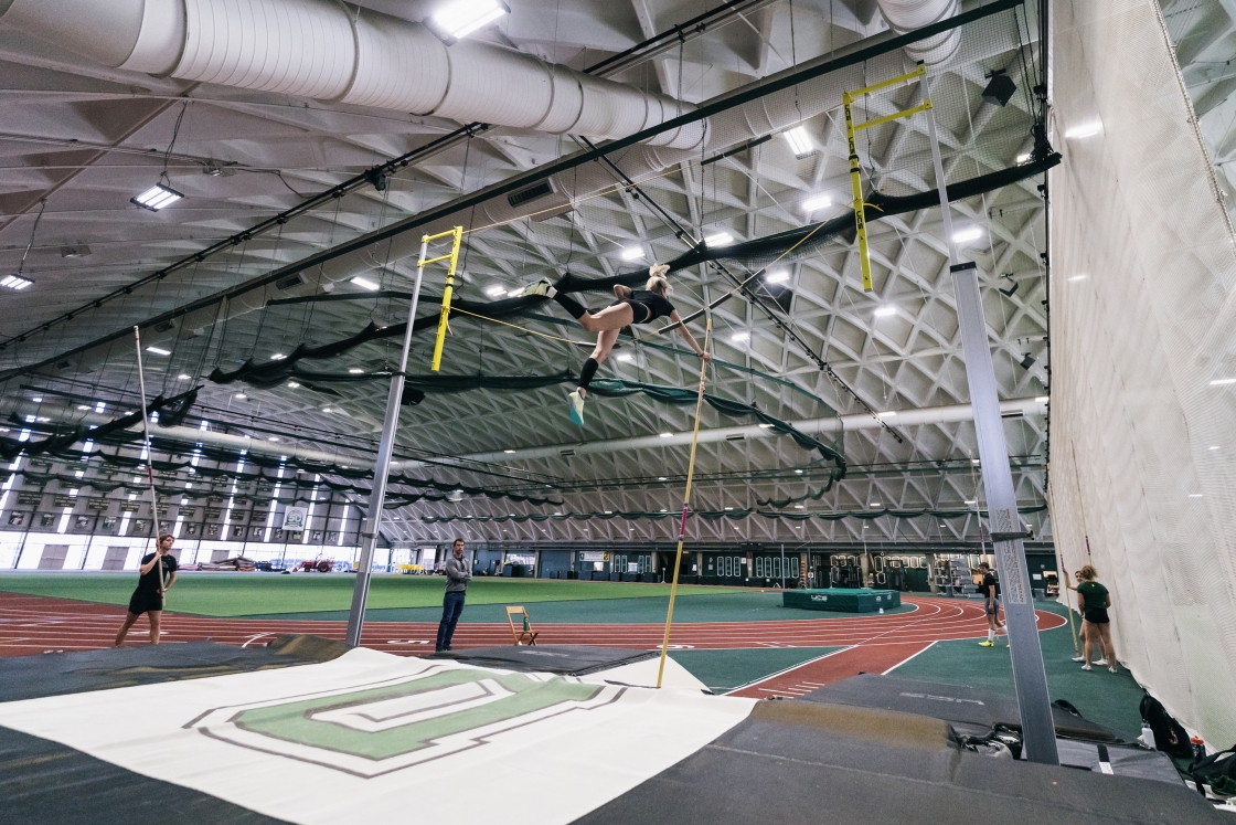 Pole vault practice in Leverone Field House.