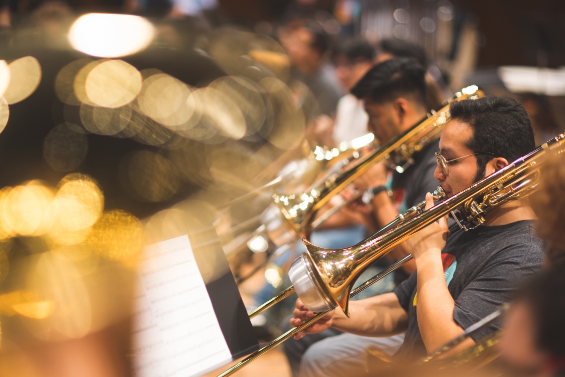 Tony, a student with UNAM, plays trombone