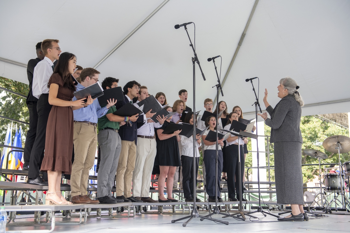 Dartmouth College Glee Club Assistant Director Irma Mellinger directs the singers.