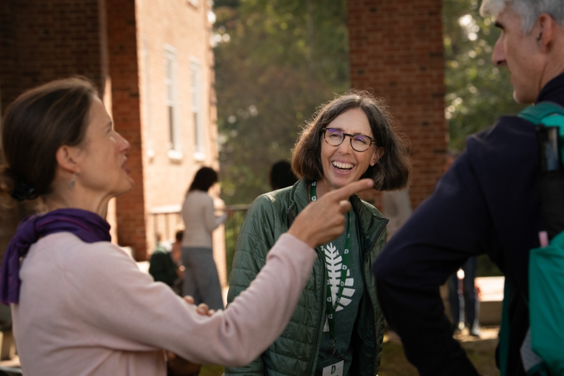 Woman smiling in conversation