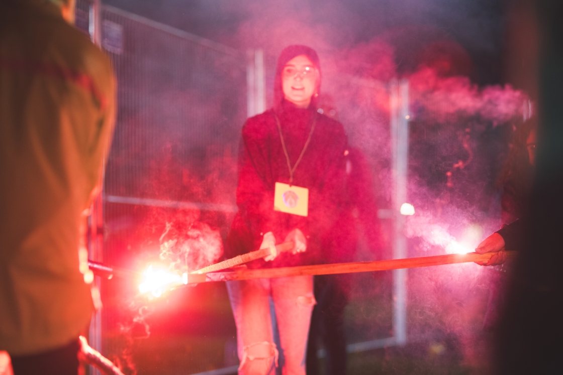 Bonfire committee students light the bonfire