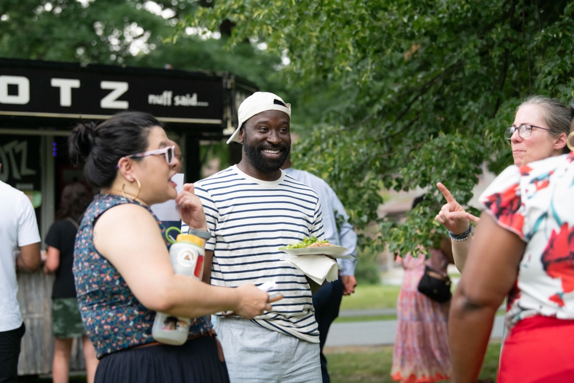 Juneteenth attendees eat and chat