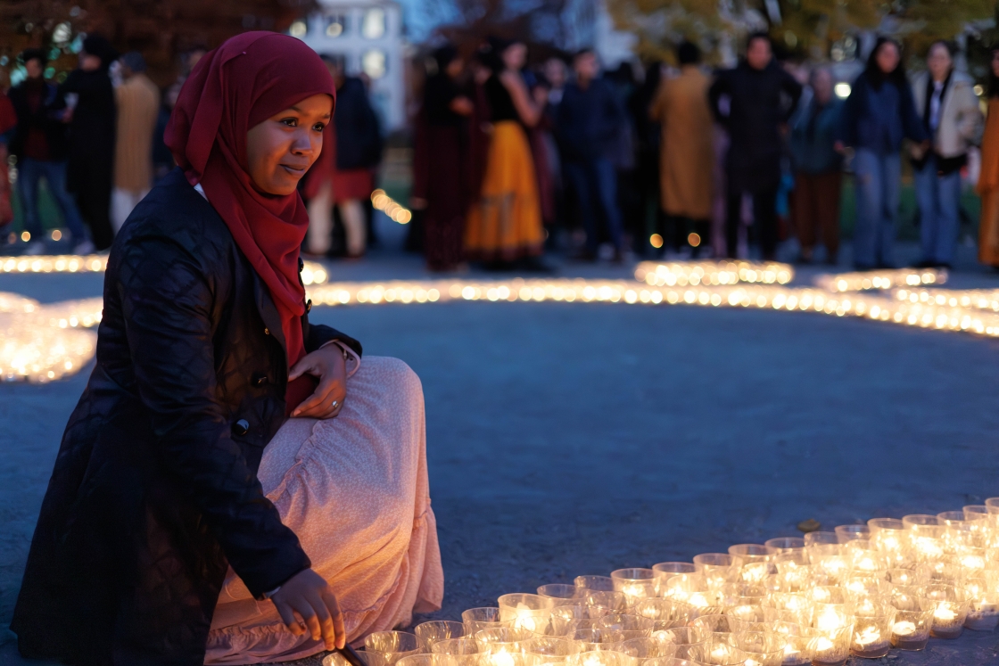 Woman lighting candles