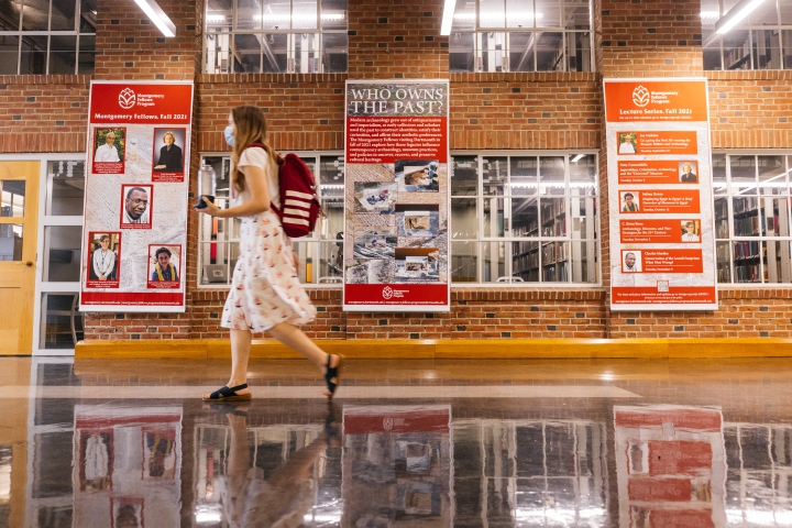 Banners in Dartmouth Library's Baker-Berry Library promote the fall Montgomery Fellows series, "Who Owns the Past."