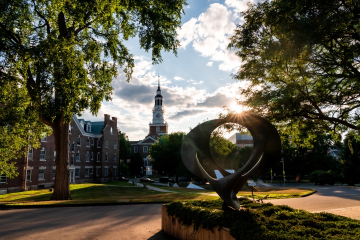 Baker Tower and a sculpture at sunset