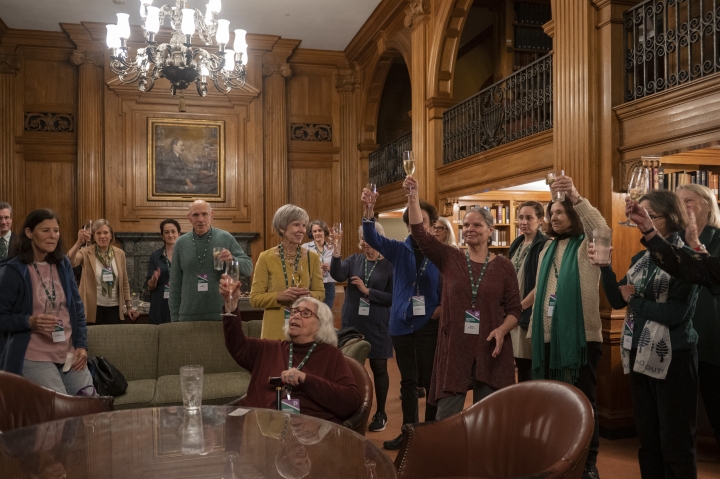 Alumni meet in the Baker Tower Room to toast the 50th anniversary of coeducation at Dartmouth