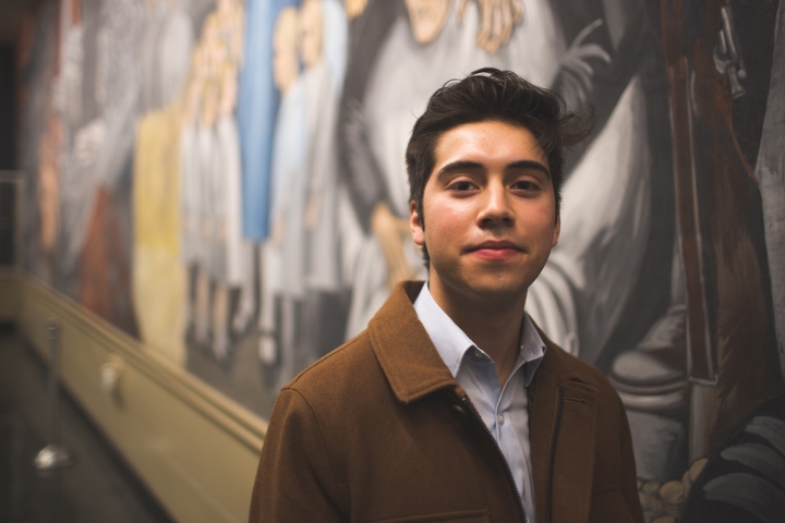 Ignacio Gutierrez in front of the Orozco mural