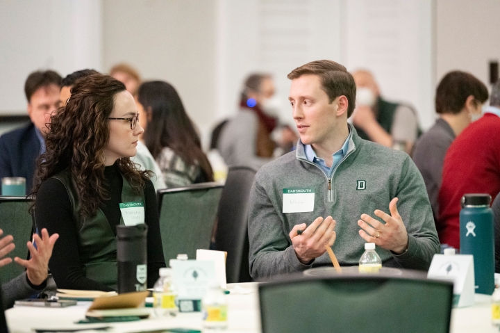 Tuck's Margaux Lohry and Will Conroy talk together.