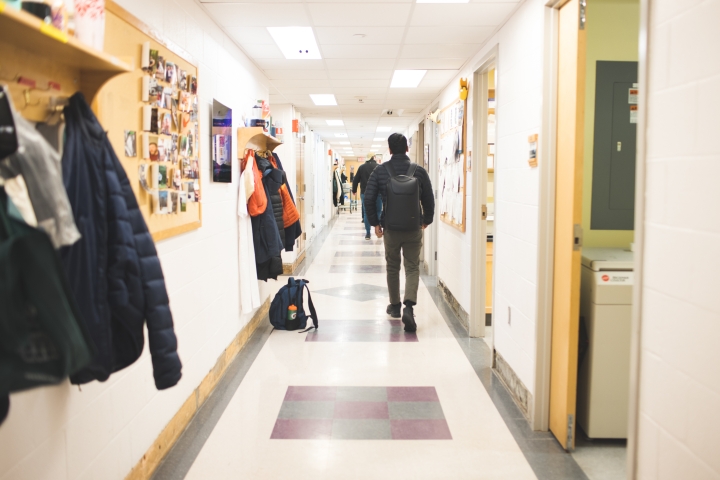 People walking the halls of Remsen after a fire broke out on Sunday.