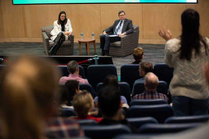 Sian Beilock and Charlie Wheelan listen to student ask a question