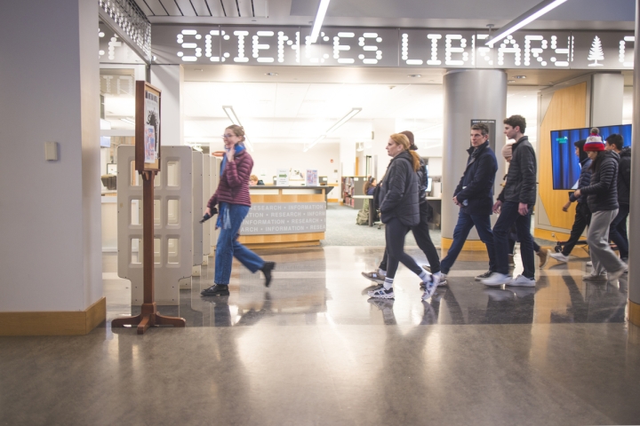 People walking in the Baker-Berry Library