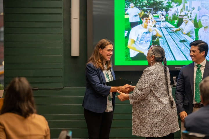 President Beilock giving out a certificate