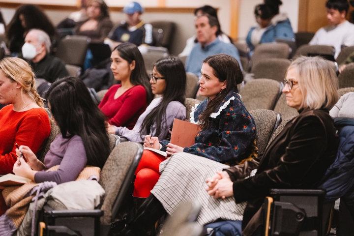 Dartmouth community members listening to speakers