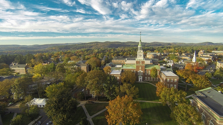 an overhead shot of Baker tower with blue sky and white clouds overhead