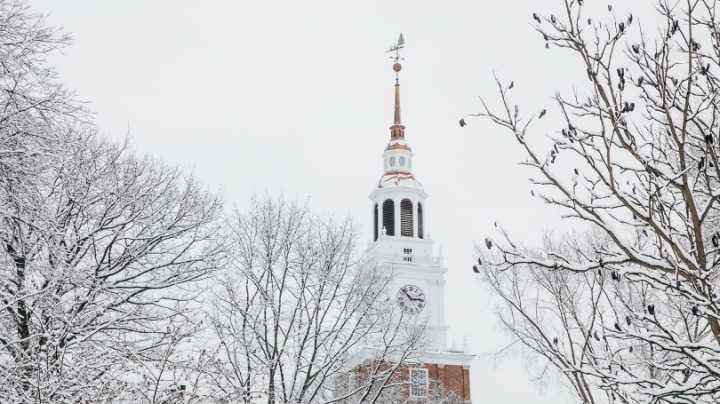 the top of Baker Tower surrounded by snow covered trees