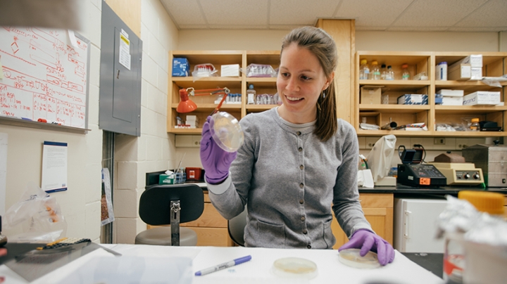 Anne Woodbrey working in a science lab