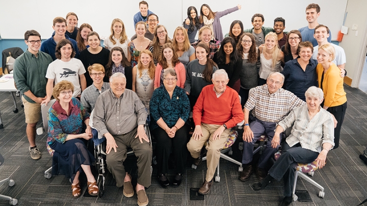 A group of students and seniors posing together for a photo