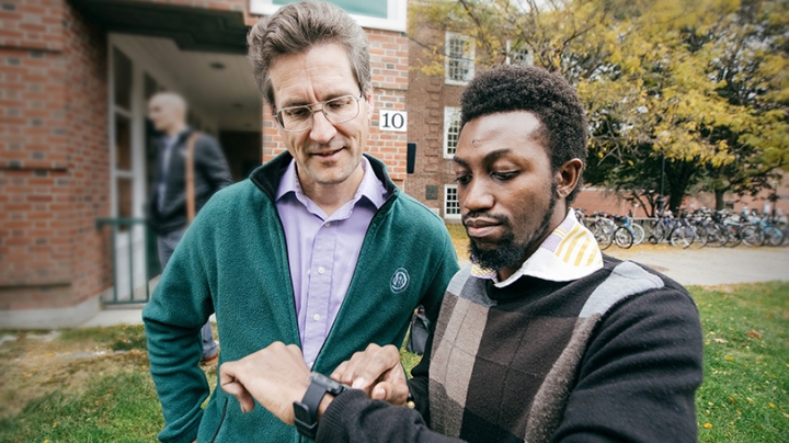 Professor David Kotz '86 (left) and George Boateng 