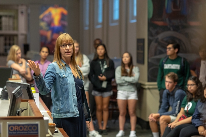 The Class of 2022 gathers in front of José Clemente Orozco’s 