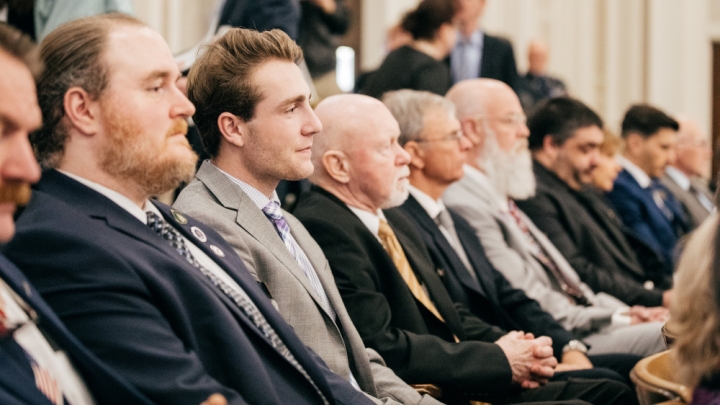State Representative Garrett Muscatel '20, listens to debate from his seat on the floor of the New Hampshire House.