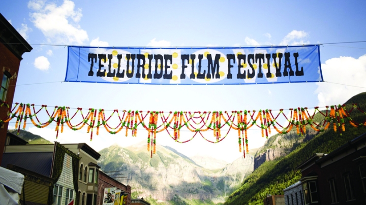 Telluride banner hanging up across a road in Telluride