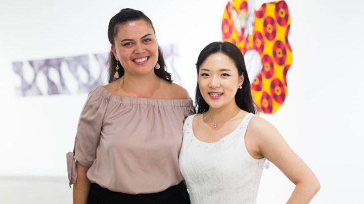 Emily Neely ’17, left, received the Sudler Prize, and Min Jee Kim ’17 received a Eugene Roitman 1943 Memorial Award at the annual arts awards ceremony at the Hopkins Center for the Arts. 