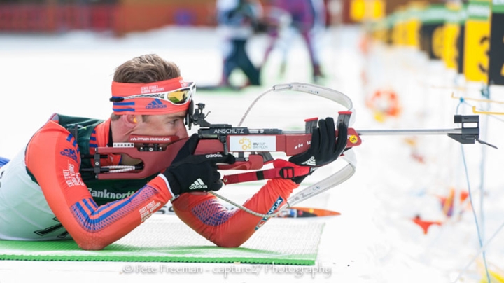 Max Durtschi taking aim during biathlon