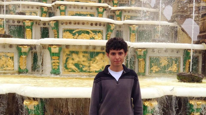 Aldo Arellano stands before the Grand Cascade fountains at the Peterhof Palace