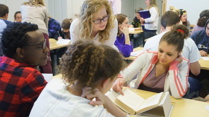 In Professor Ivy Schweitzer’s “American Poetry” class, undergraduates and area high school students examine first editions of Emily Dickinson and Walt Whitman at Rauner Special Collections Library.
