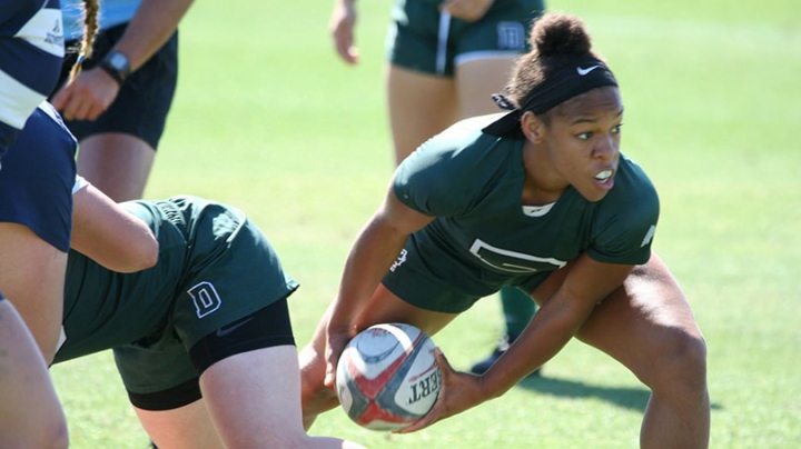 A rugby player gets ready to throw the ball.