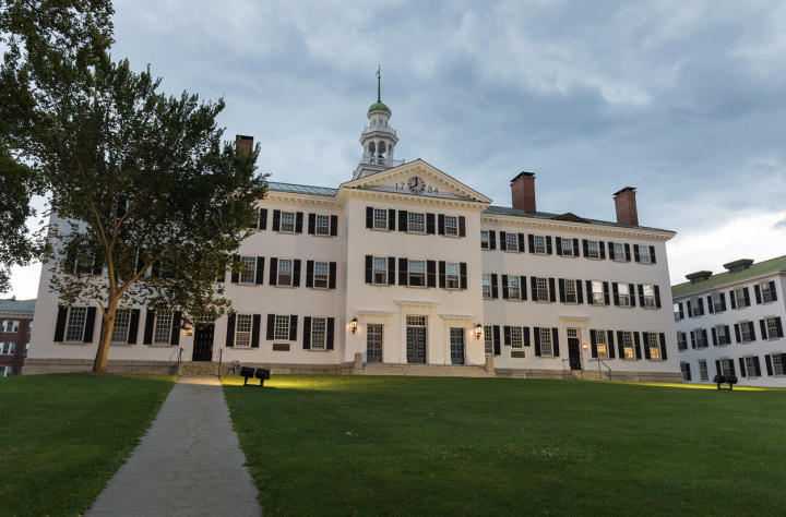 A photo of Dartmouth Hall at night