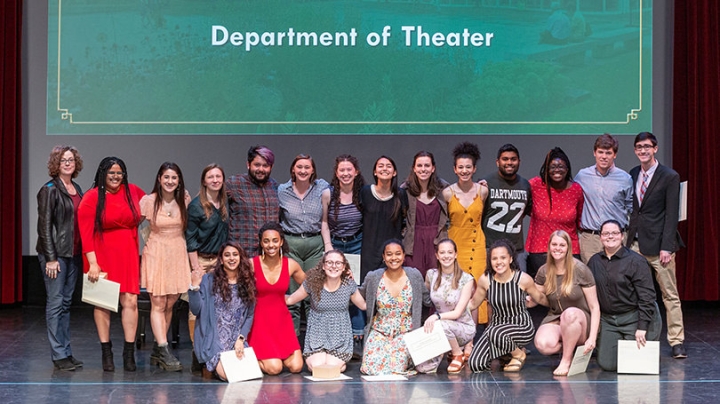 Winners of awards for excellence in theater gather on stage at Spaulding Auditorium.