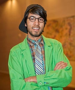 Joseph Singh ’14 smiling for the camera