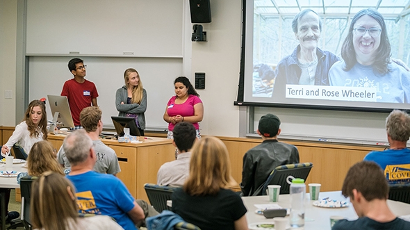students in a classroom giving a presentation