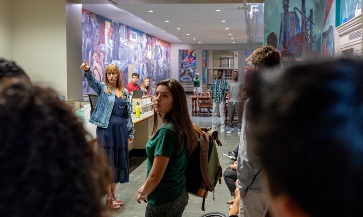 Professor Mary Coffey answers questions from ’22s about the Orozco mural