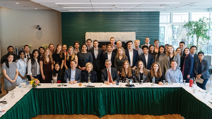 Students from the War and Peace program and U.S. foreign policy and international security postdoctoral fellows pose with Hillary Rodham Clinton after an hour-long conversation with the former secretary of state.