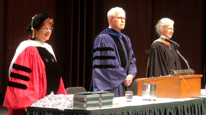 The Phi Beta Kappa governing board welcomes the inductees.