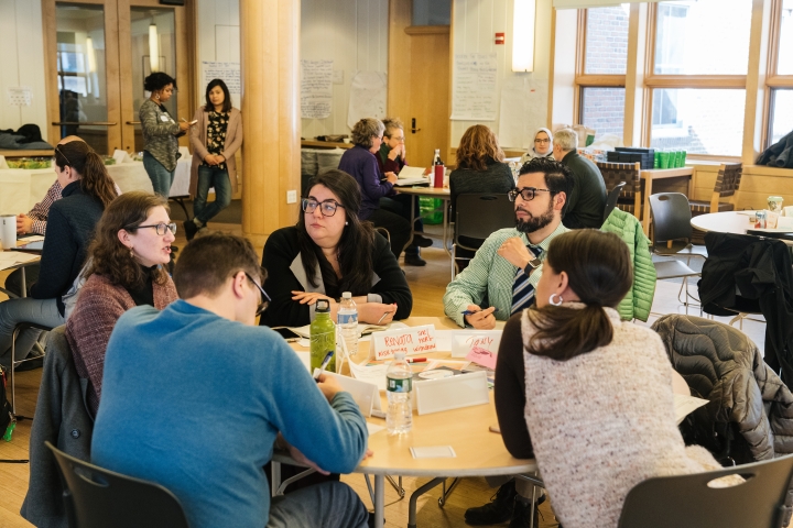 C3I Ambassadors break up into small groups at a training session in Occom Commons.