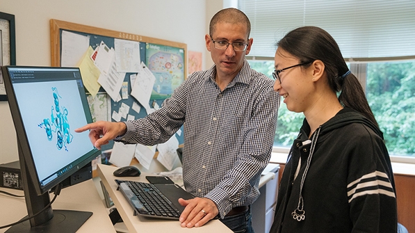 Assistant Professor Michael Ragusa and graduate student ​Xue “Sherry” Xia