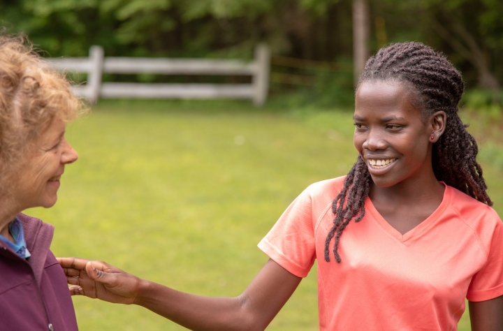 Nasera Victoria, center, talks with Lindsay Putnam